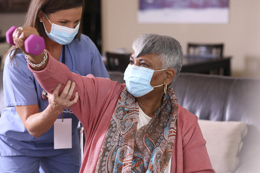 enfermera paciente fisioterapia